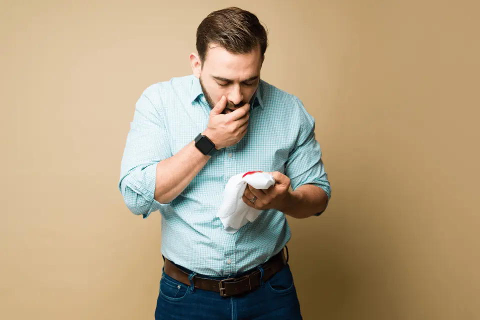 Coughing Up Bright Red Blood: Is It an Emergency?